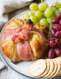 Bacon Wrapped Baked Brie in Puff Pastry Recipe #ASpicyPerspective #bakedbrie #holidays #christmas