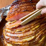 Must-Make Apple Stuffed Baked Ham with Honey Mustard Glaze on ASpicyPerspective.com #ham #easter #holiday #thebest