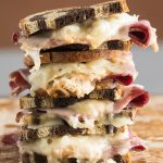 Baked Reuben Party Sandwiches Recipe #ASpicyPerspective #partysandwiches #bakedsandwiches