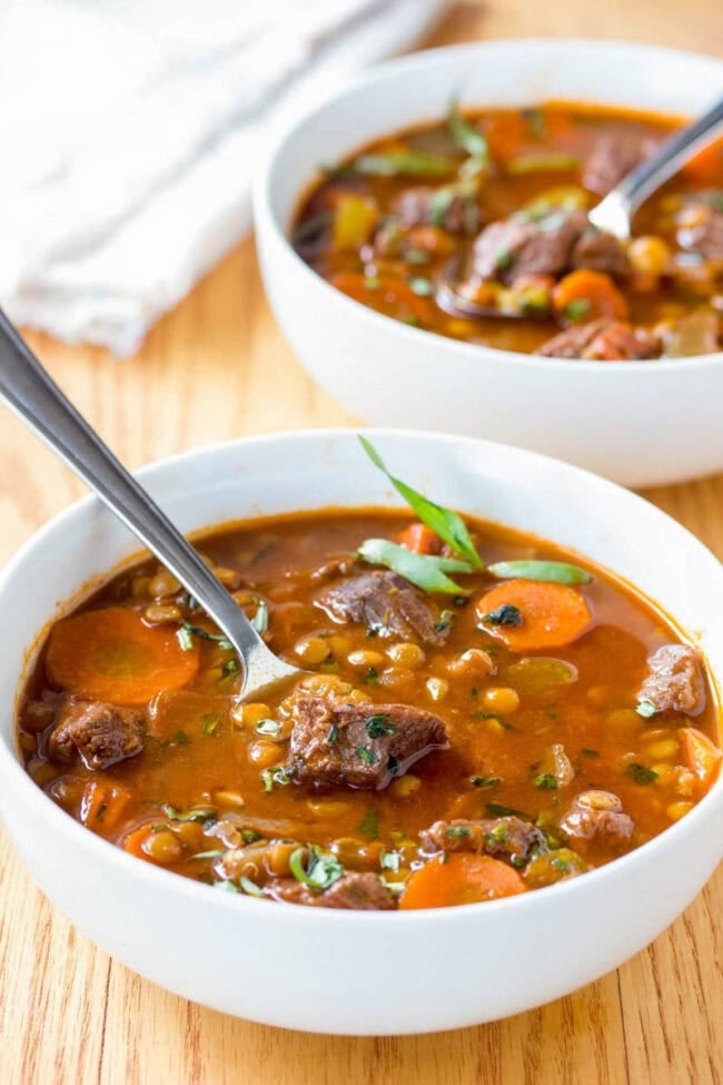 Beef Lentil Stew in bowl with spoon