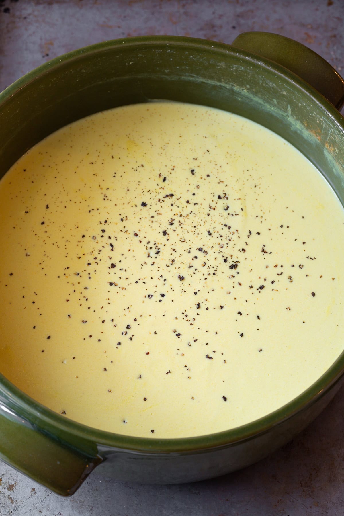 Beer Cheese Soup Recipe being cooked in a large pot. 