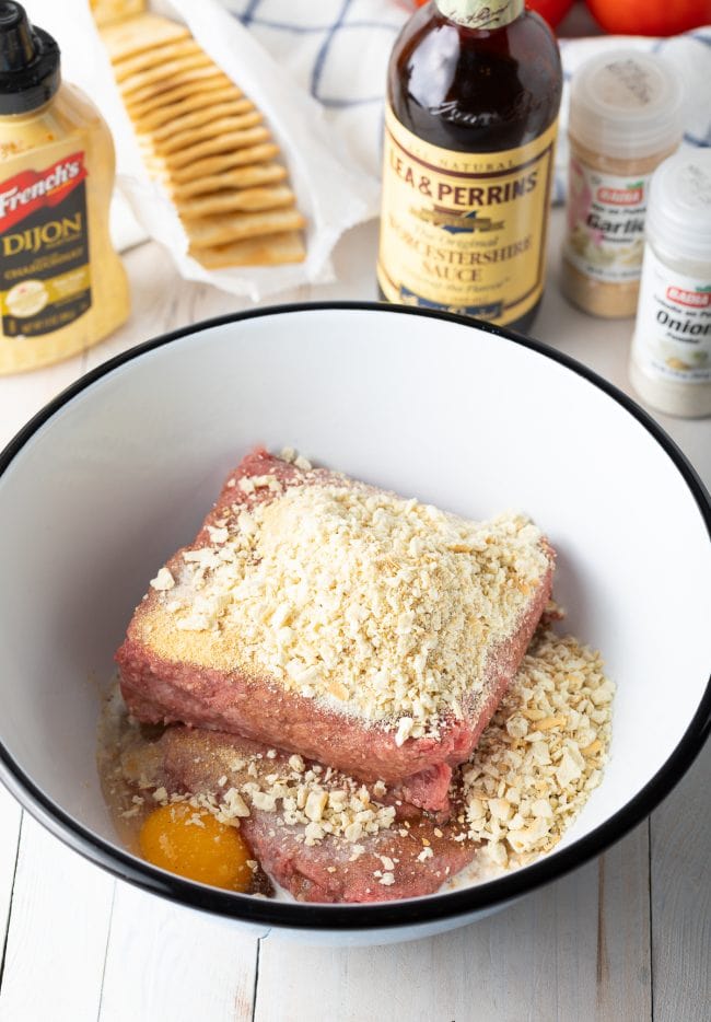 Ground beef with the other ingredients needed for hamburger patties. 