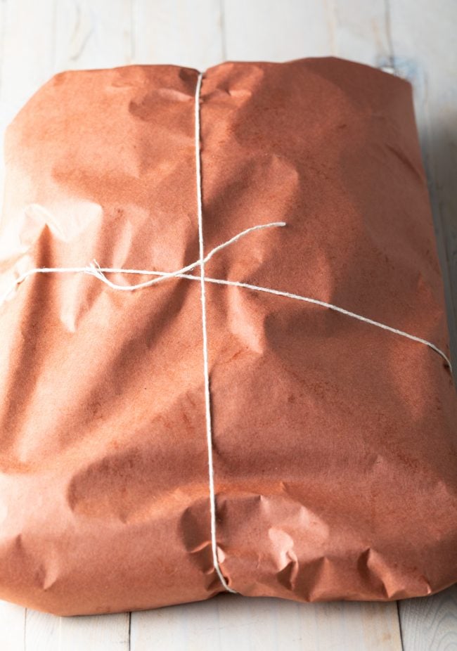 meat wrapped in butcher paper and tied with twine