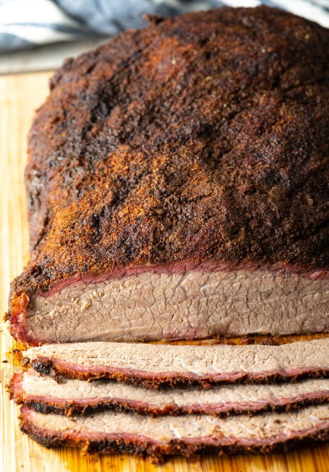 overhead view of beef slices on a cutting board