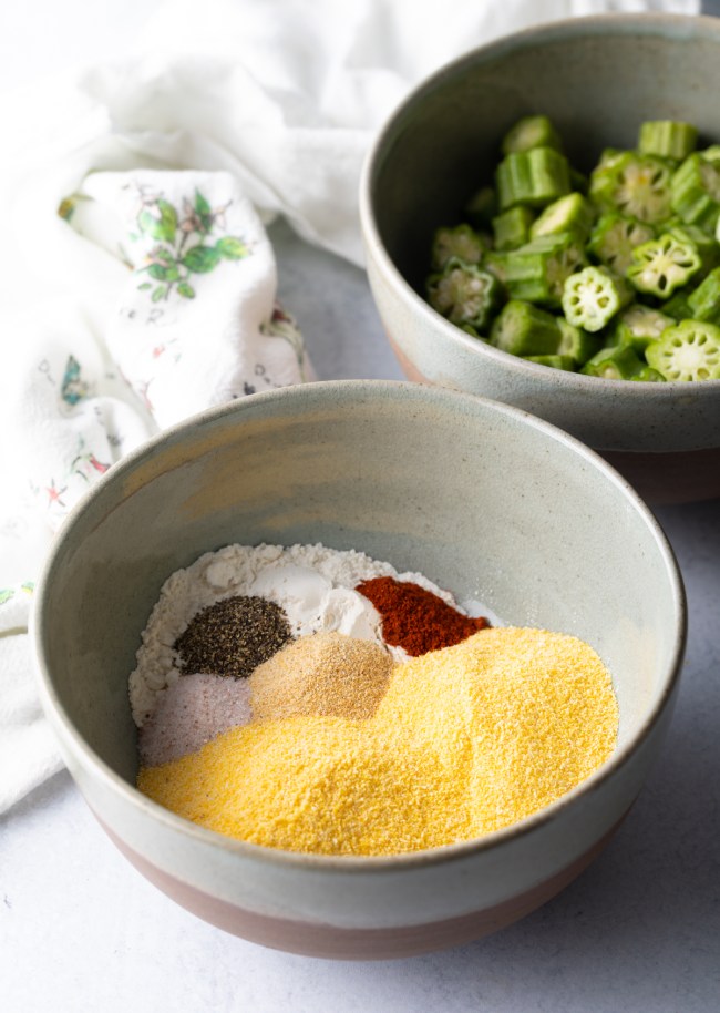Bowl with cornmeal, flour, and spices.