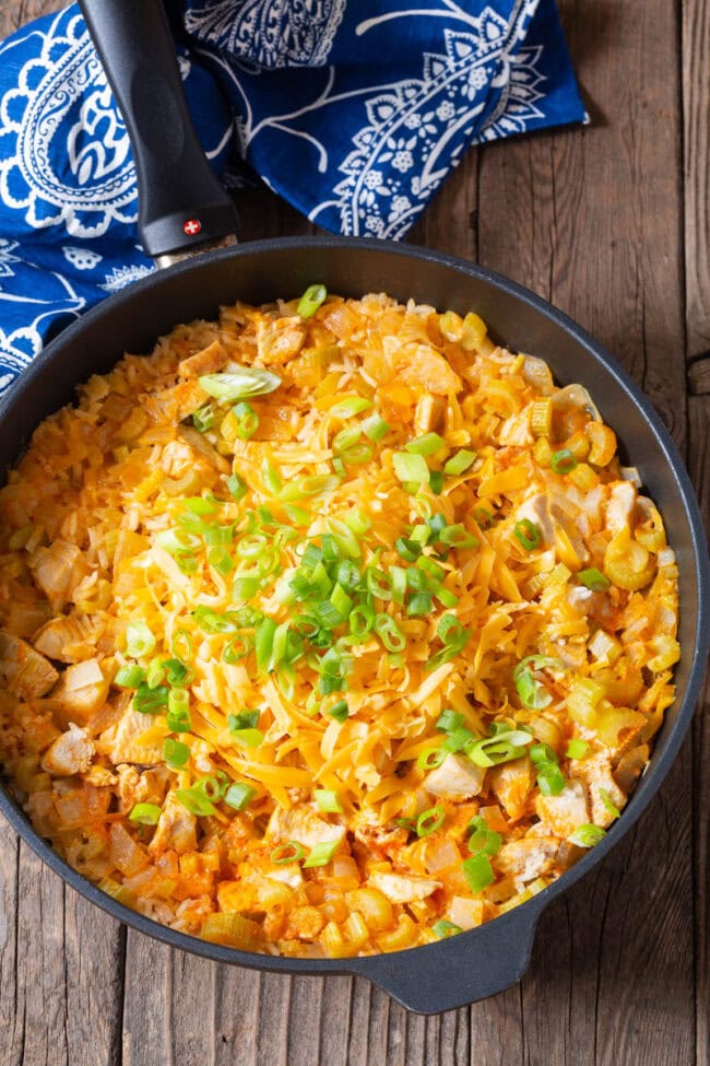 Buffalo chicken casserole in a skillet. 