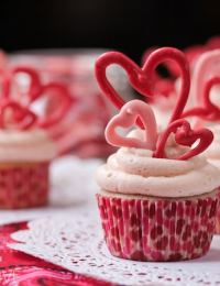 Buttermilk Cupcakes with Creamy Cherry Frosting and Chocolate Hearts