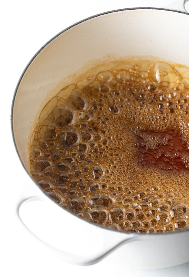 large pot with water and sugar simmering