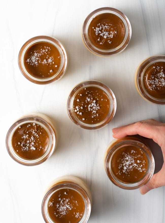 top view jars topped with caramel and sea salt