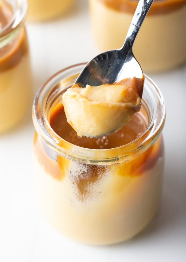 Italian Dessert Recipes - spoon scooping butterscotch pudding from a jar