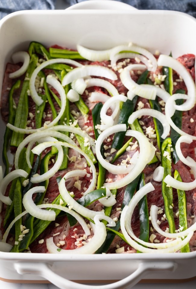 top view of marinating steak and vegetables
