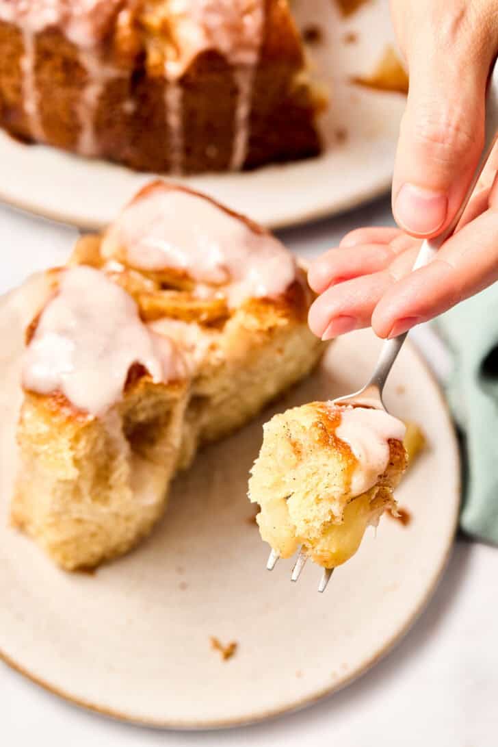 Challah Bread with Apples - fork lifting bite of bread