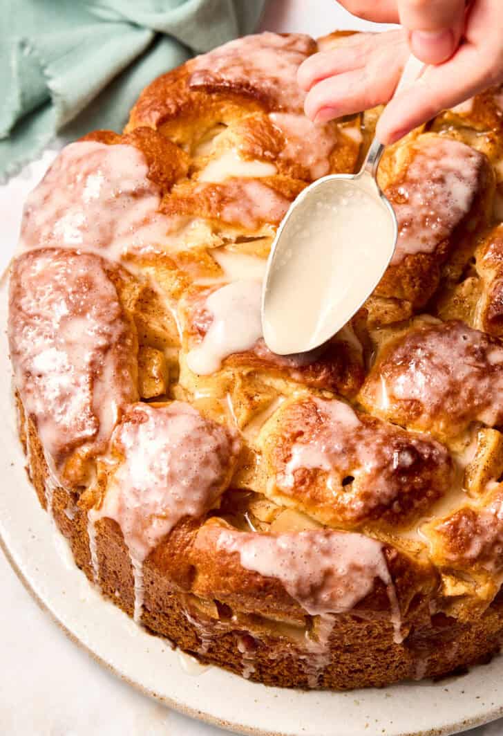 Challah Bread with Apples - drizzling glaze over top