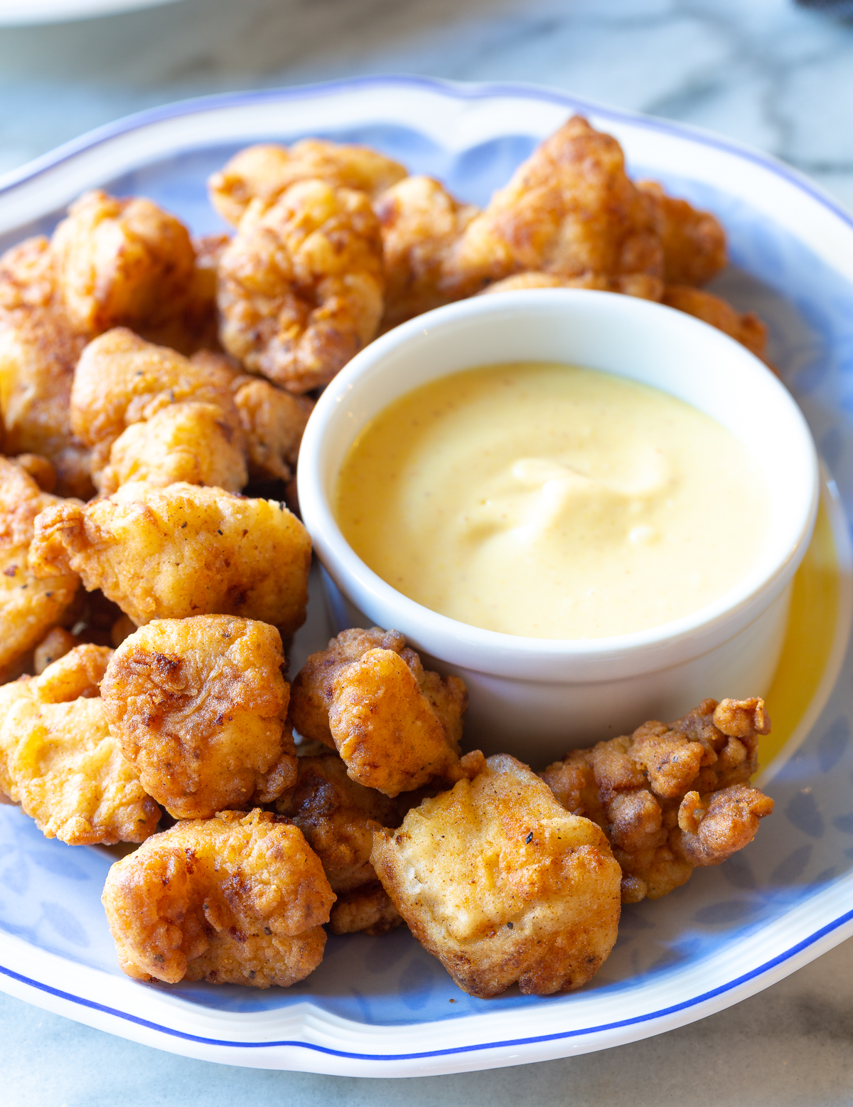 Chick fil a nuggets and sauce - close up on plate