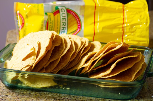 lay the tostadas in the baking pan