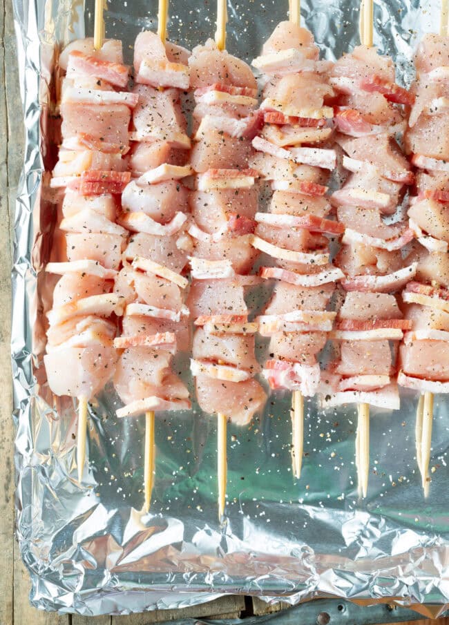 Kabobs with chicken and bacon on foil ready for the grill

Chicken Skewers Recipe with Chipotle BBQ Sauce