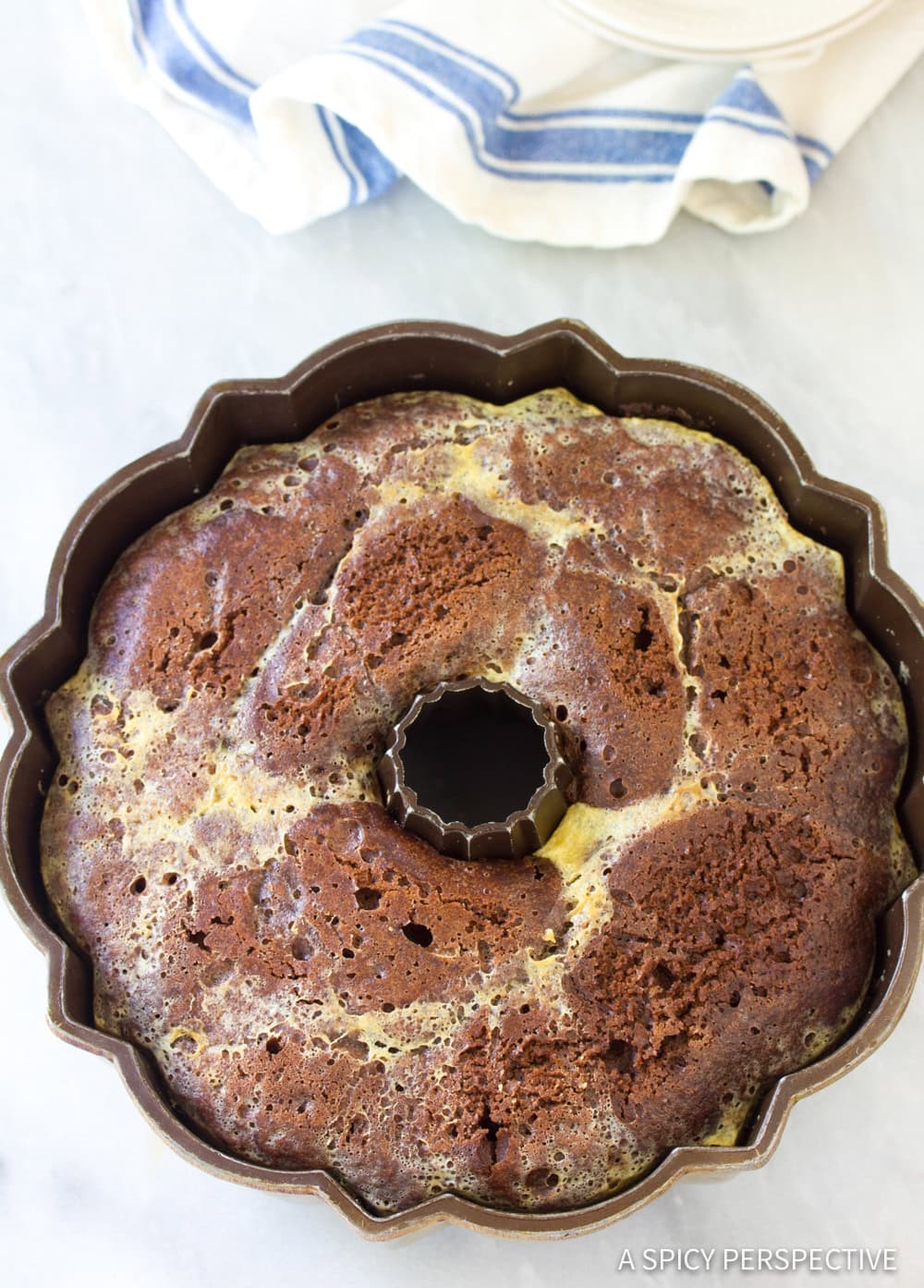 Bottom of chocoflan after it is baked and still in the bundt pan.