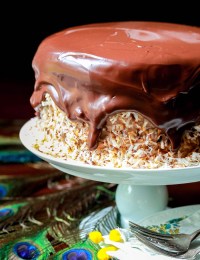 Chocolate coconut cake with bananas covered in ganache