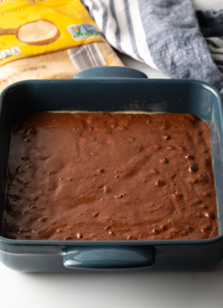 Chocolate cake batter in a pan.