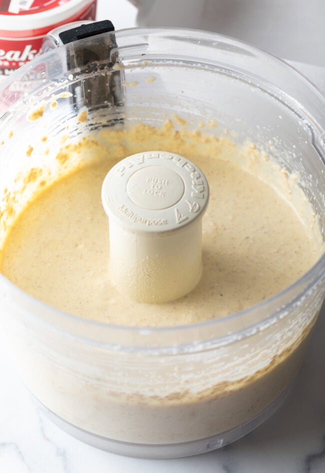 Blended ingredients into a white batter.