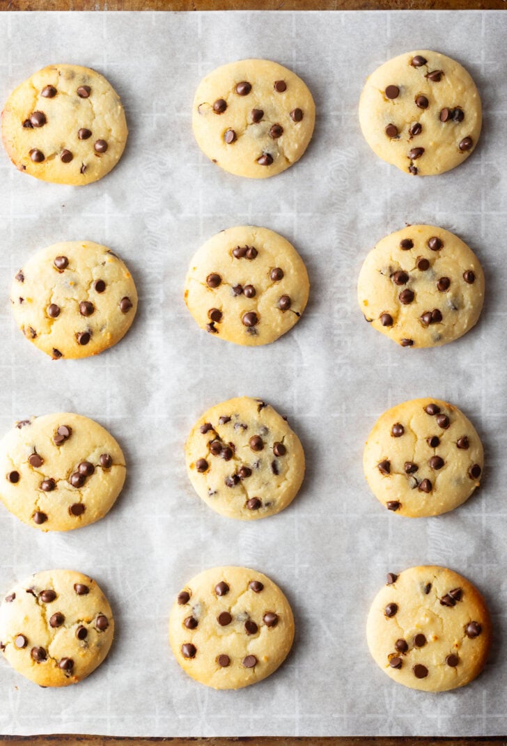 8 cottage cheese chocolate chip cookies cooling on a baking sheet.