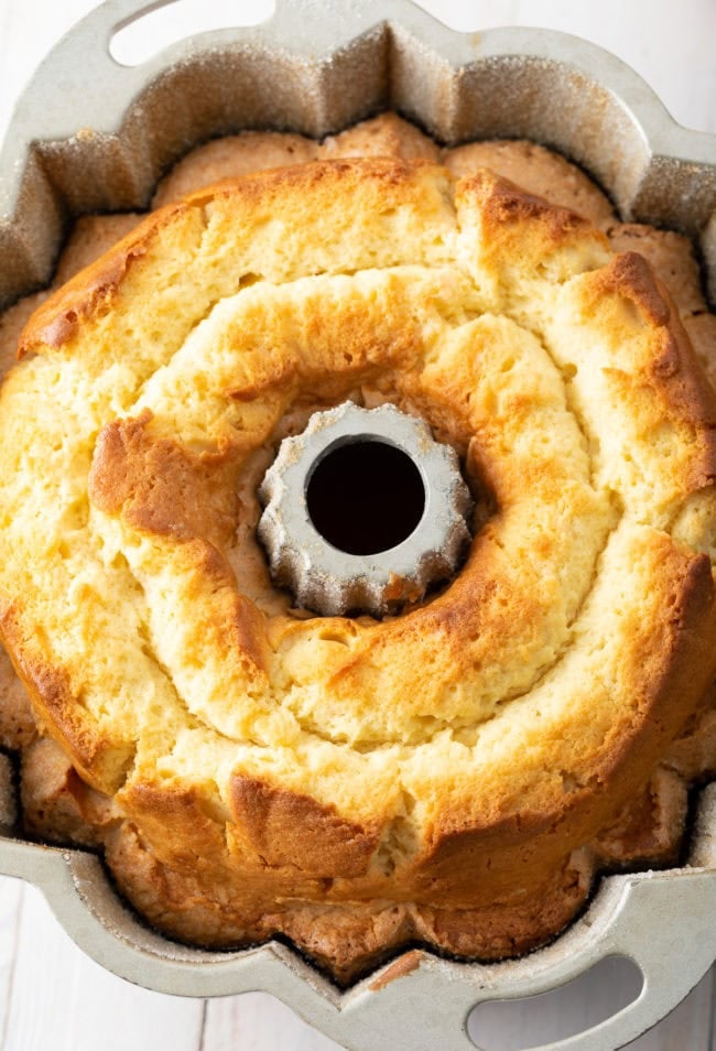 Bundt cake pan with the finished pound cake inside ready to be turned out