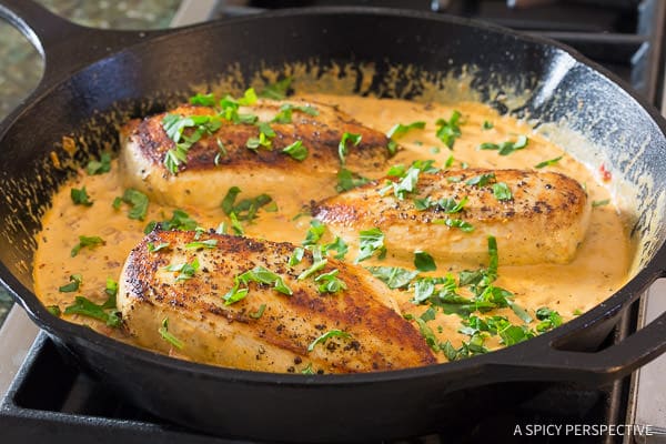 How to Make Red Pepper Chicken - skillet with creamy chicken breast and sauce