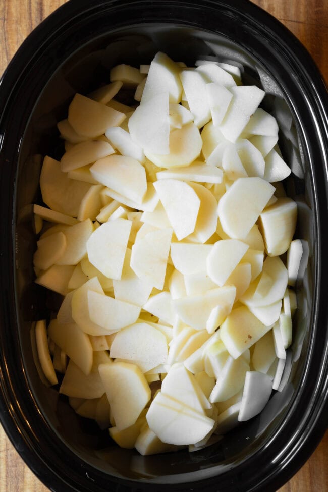 overhead view of potatoes in a slow cooker