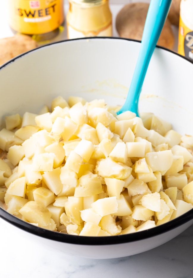 Cooked chopped potatoes in the mixing bowl.