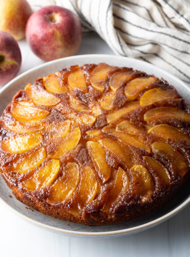 Apple upside down cake on a platter.