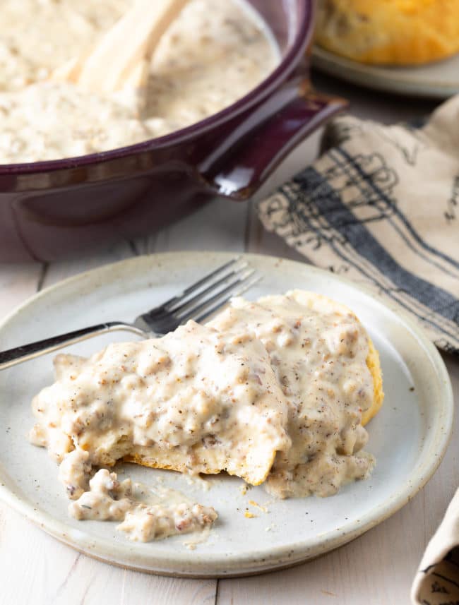 Easy Sausage Gravy and Biscuits on a plate. 