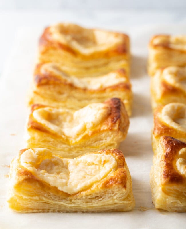 Rows of Starbucks cheese danishes freshly baked.