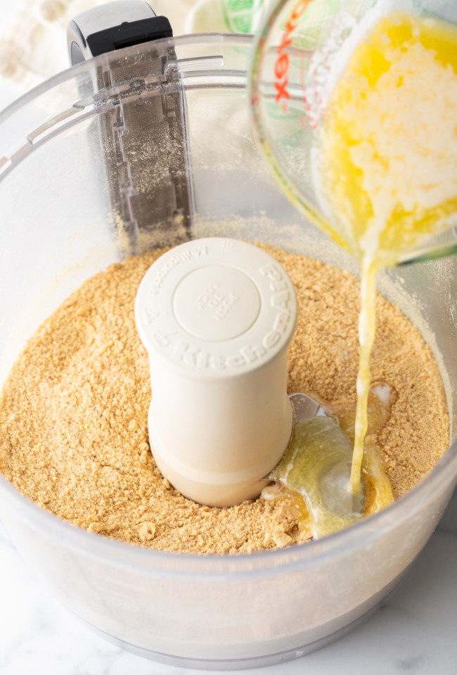 graham crackers and butter in a food processor