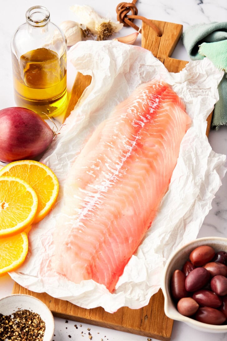 ingredients for grilled grouper on cutting board