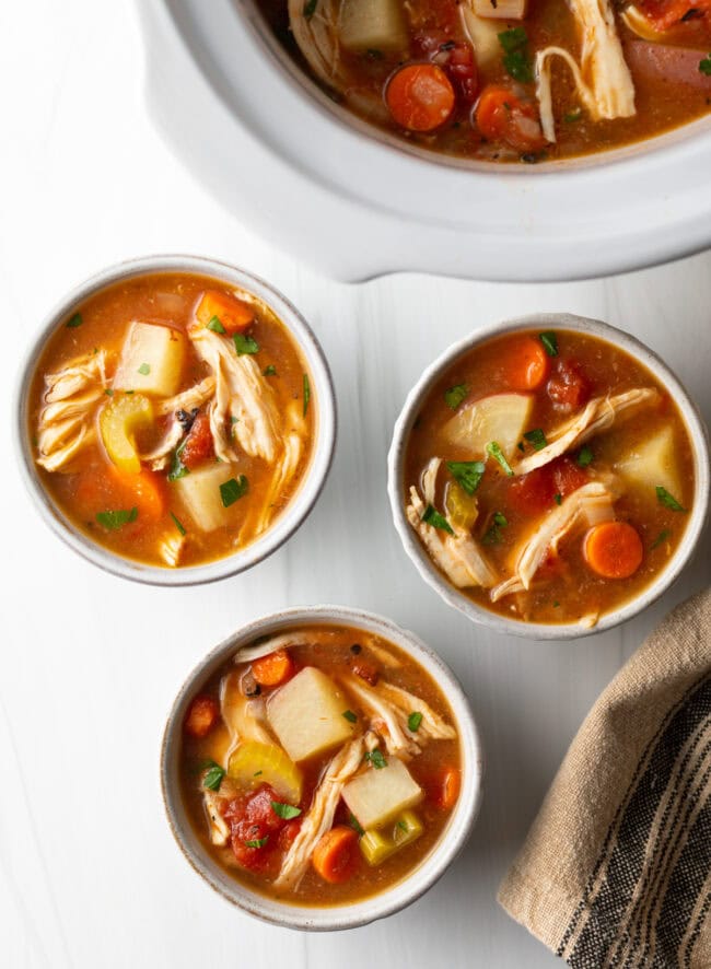 Chicken Stew Crock Pot - Top down view three bowls of Healthy Chicken Stew Slow Cooker Recipe.