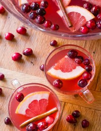 Holiday Champagne Punch Recipe on ASpicyPerspective.com #newyearseve #christmas