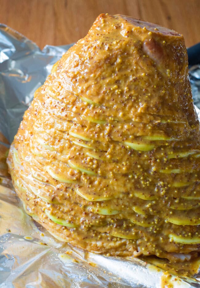 Honey mustard glaze on the ham before being baked. 