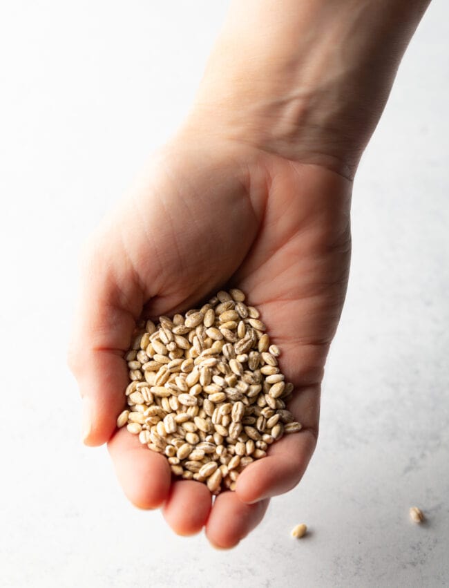 Hand with grains.