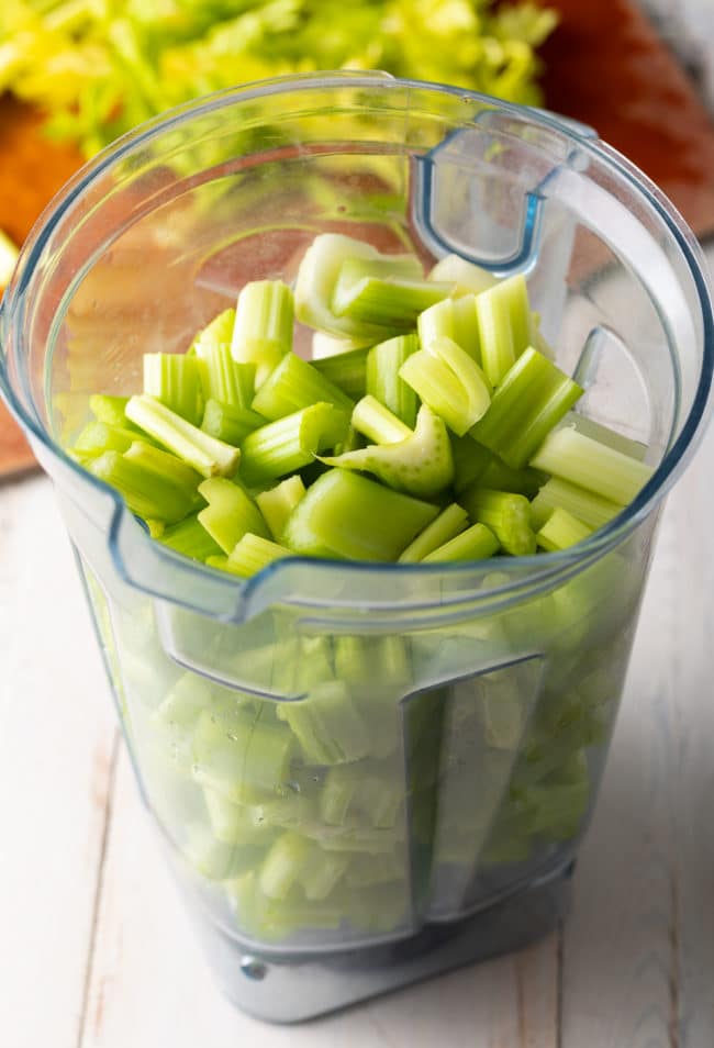 Celery chunks in a large blender. 