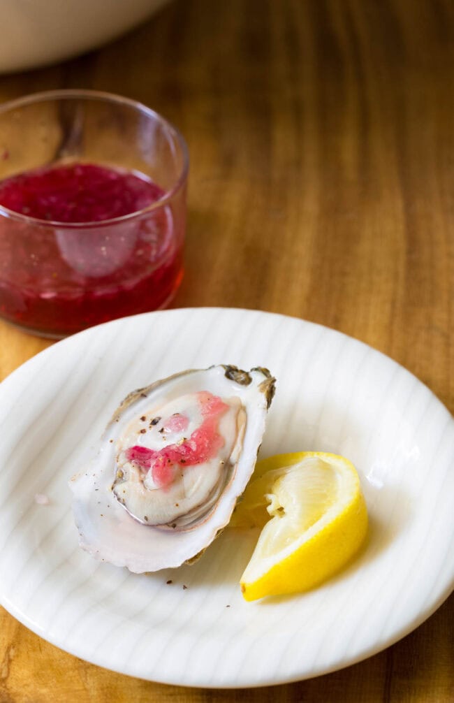 Raw Oyster with shallot mignonette on top. 