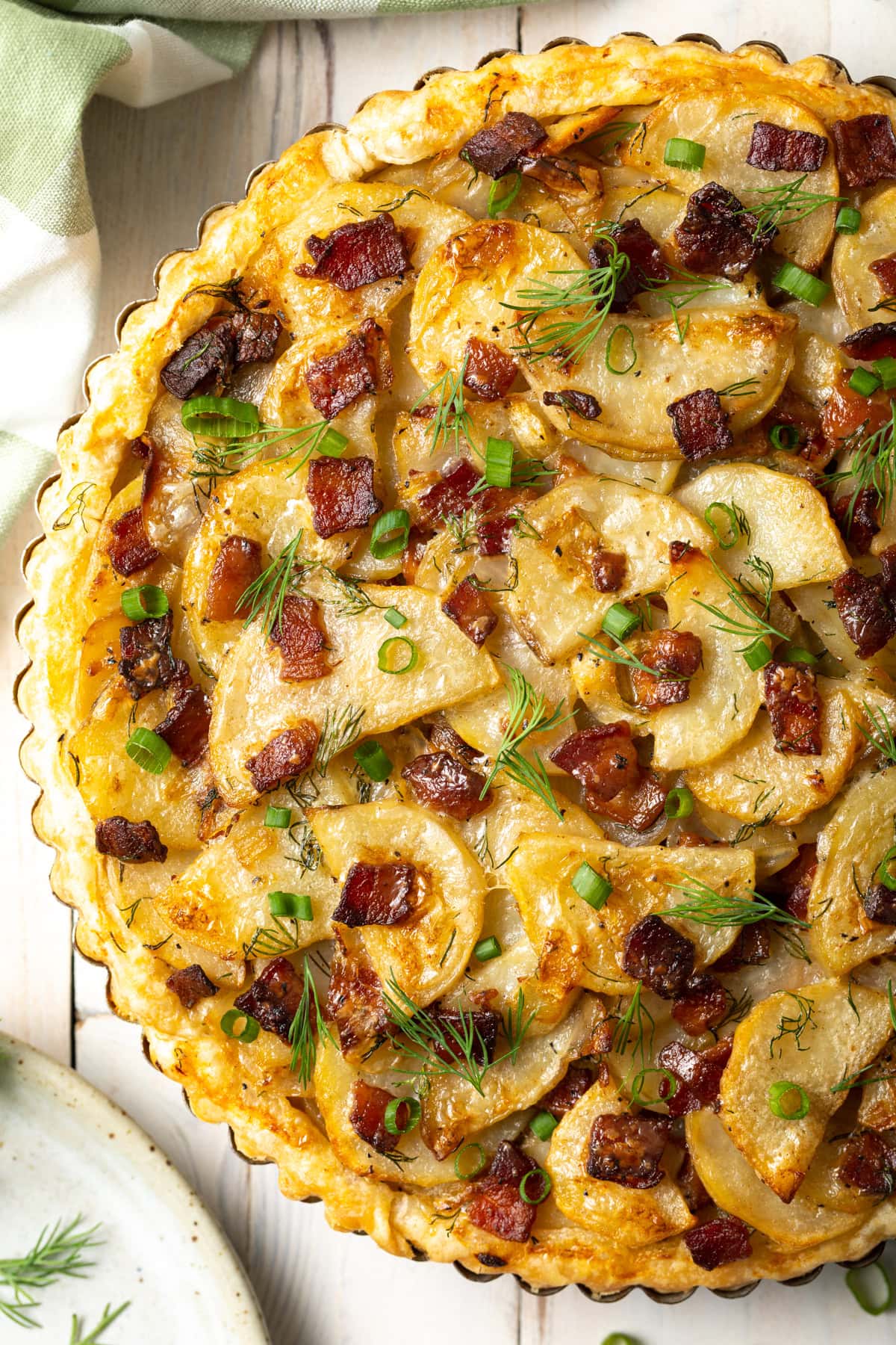 Overhead shot of Irish potato pie in a tart tin. 