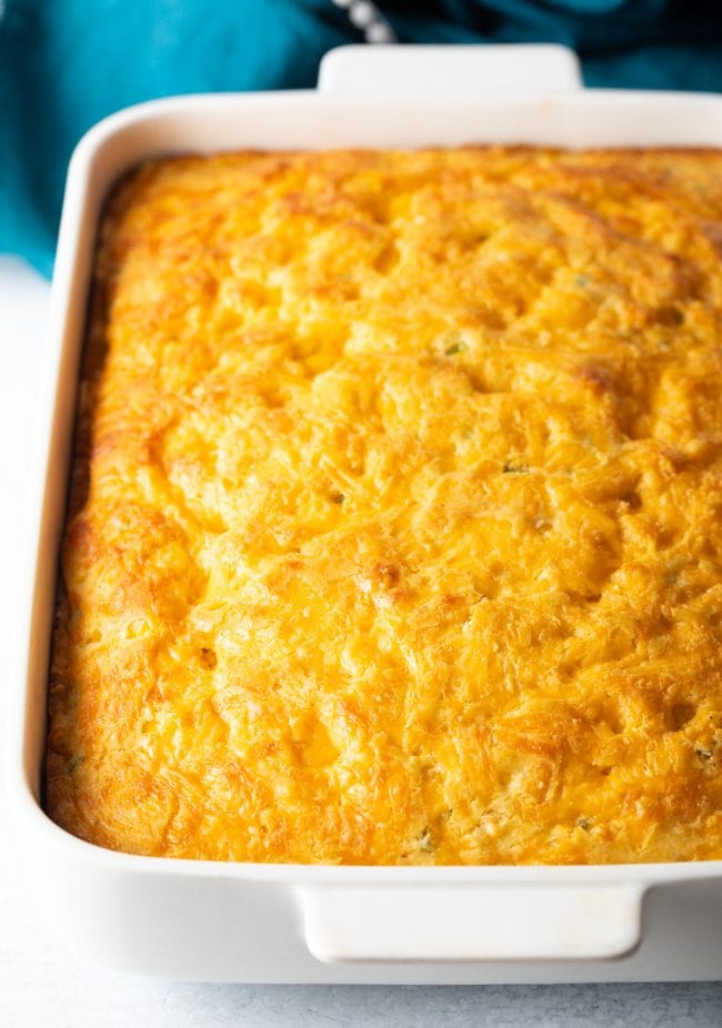 baked dish of jalapeno cheddar cornbread covered in cheese