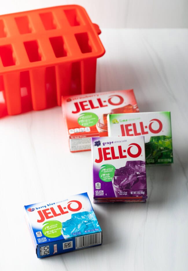 Boxes of berry blue, grape, lime, and strawberry jello.