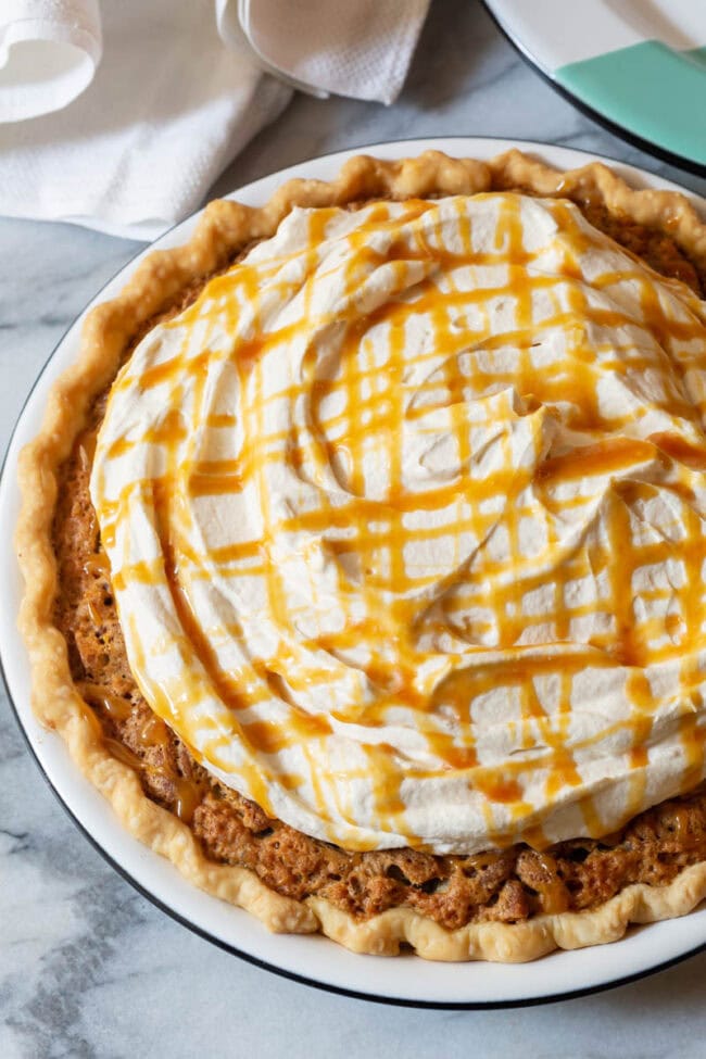 Salted caramel whipped cream on derby pie