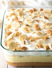 Layered Banana Pudding Bake Recipe #ASpicyPerspective #easter #bananacake #spring #potluck #picnic