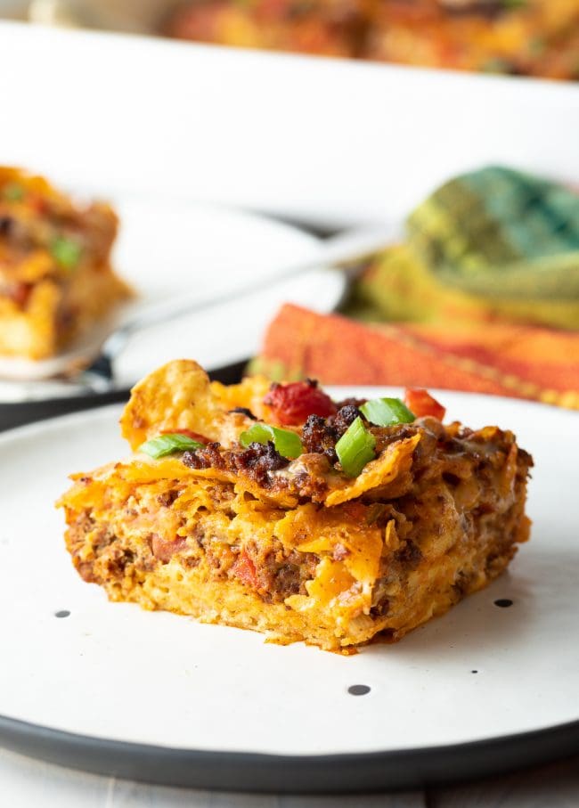 Slice of Mexican breakfast casserole on a plate. 