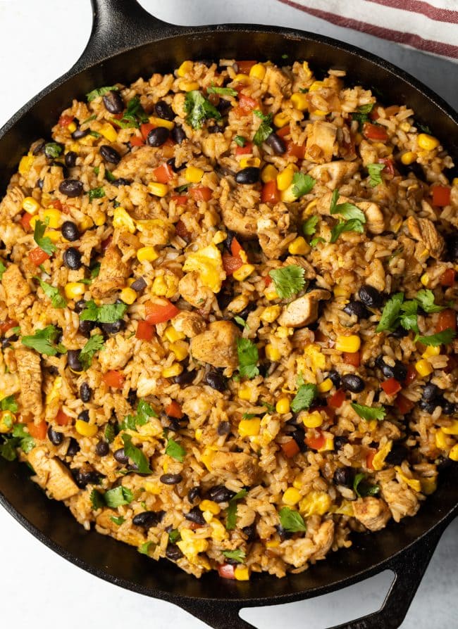 Mexican chicken fried rice in a skillet.