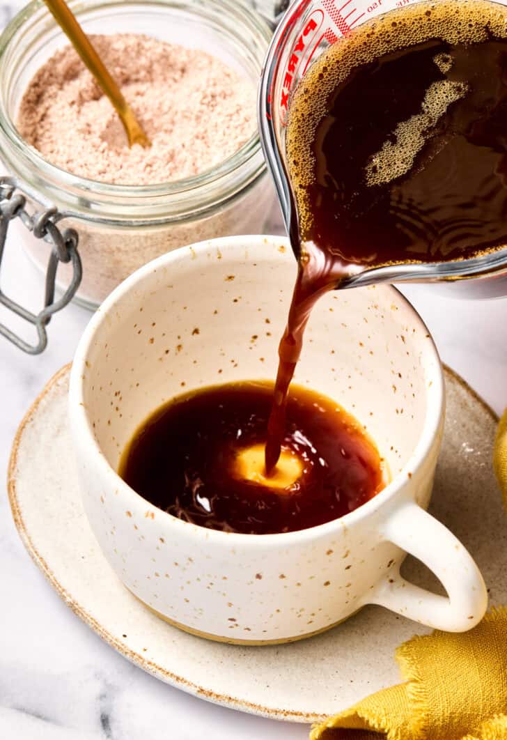 Pouring Mexican Coffee into cup