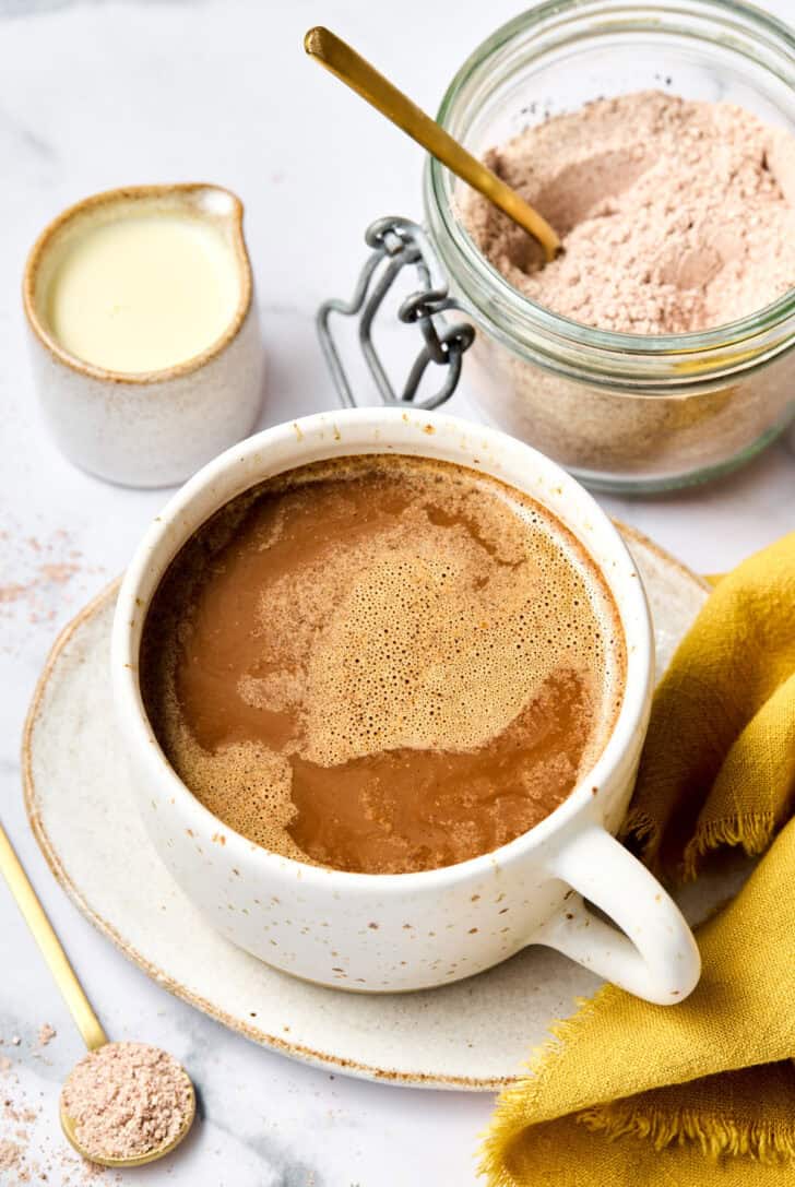 Mexican Mocha in mug with ingredients surrounding it