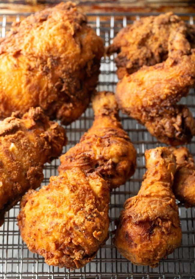 Fried chicken on a wire rack.